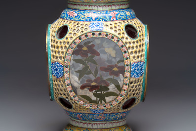 A very rare pair of Chinese Canton enamel lanterns with reverse painted glass panels, Qianlong