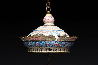 A very rare pair of Chinese Canton enamel lanterns with reverse painted glass panels, Qianlong