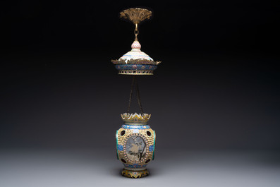 A very rare pair of Chinese Canton enamel lanterns with reverse painted glass panels, Qianlong