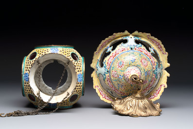 A very rare pair of Chinese Canton enamel lanterns with reverse painted glass panels, Qianlong
