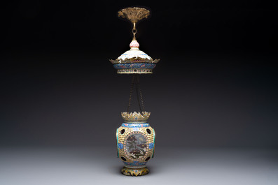 A very rare pair of Chinese Canton enamel lanterns with reverse painted glass panels, Qianlong