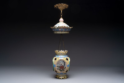 A very rare pair of Chinese Canton enamel lanterns with reverse painted glass panels, Qianlong