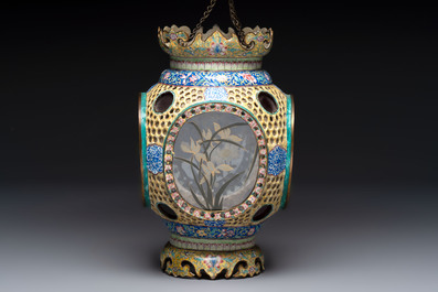 A very rare pair of Chinese Canton enamel lanterns with reverse painted glass panels, Qianlong