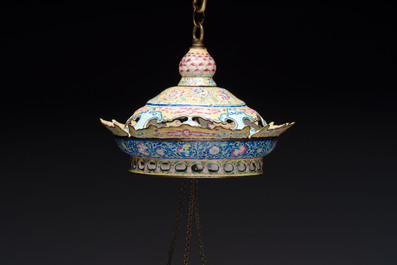 A very rare pair of Chinese Canton enamel lanterns with reverse painted glass panels, Qianlong