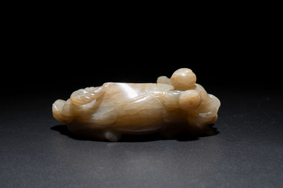 A Chinese jade 'boy on a buffalo' group, Qing
