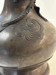 A pair of Chinese or Vietnamese gold-splashed bronze garlic-mouth 'dragon' vases, with seal mark, 17/18th C.