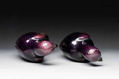 A pair of Chinese aubergine-glazed eagles, 19th C.