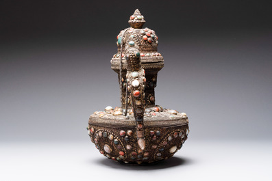 A massive Tibetan stone-inlaid copper filigree ewer and cover, 19/20th C.