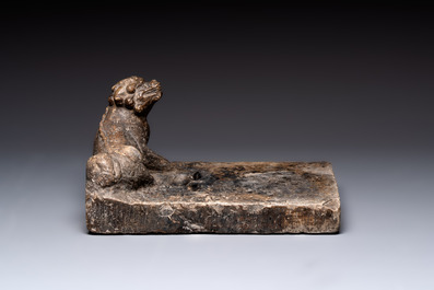 A large Chinese 'Buddhist lion' ink stone, Ming