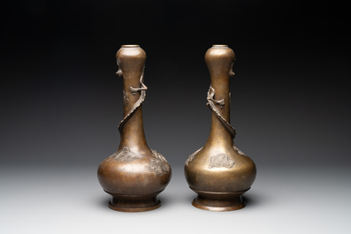A pair of Chinese or Vietnamese gold-splashed bronze garlic-mouth 'dragon' vases, with seal mark, 17/18th C.