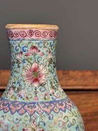 A Chinese famille rose conjoined vase with lotus scrolls, Qianlong mark, 19th C.