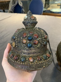 A massive Tibetan stone-inlaid copper filigree ewer and cover, 19/20th C.