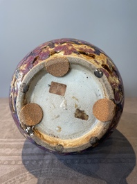 A Chinese flamb&eacute;-glazed bottle vase, 19th C.