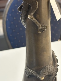A pair of Chinese or Vietnamese gold-splashed bronze garlic-mouth 'dragon' vases, with seal mark, 17/18th C.