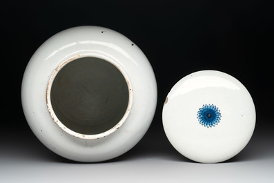 A rare large blue and white Dutch Delft albarello with original cover, 18th C.
