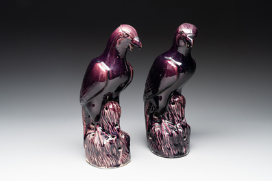 A pair of Chinese aubergine-glazed eagles, 19th C.