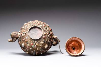 A massive Tibetan stone-inlaid copper filigree ewer and cover, 19/20th C.