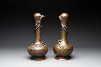 A pair of Chinese or Vietnamese gold-splashed bronze garlic-mouth 'dragon' vases, with seal mark, 17/18th C.
