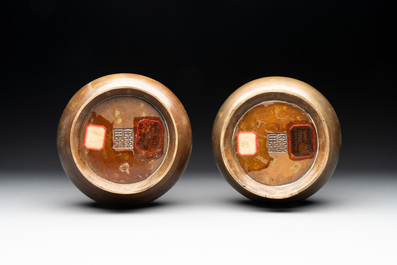 A pair of Chinese or Vietnamese gold-splashed bronze garlic-mouth 'dragon' vases, with seal mark, 17/18th C.