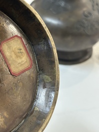 A pair of Chinese or Vietnamese gold-splashed bronze garlic-mouth 'dragon' vases, with seal mark, 17/18th C.