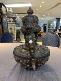 A massive Tibetan stone-inlaid copper filigree ewer and cover, 19/20th C.
