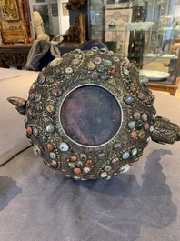 A massive Tibetan stone-inlaid copper filigree ewer and cover, 19/20th C.