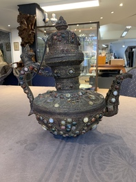 A massive Tibetan stone-inlaid copper filigree ewer and cover, 19/20th C.