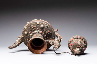 A massive Tibetan stone-inlaid copper filigree ewer and cover, 19/20th C.
