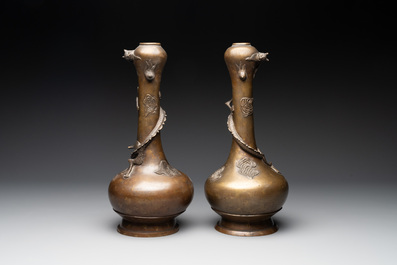 A pair of Chinese or Vietnamese gold-splashed bronze garlic-mouth 'dragon' vases, with seal mark, 17/18th C.