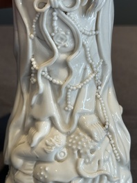 A pair of Chinese white-glazed figures and two Dehua blanc de Chine figures, Dehua 德化 and Xuande mark, 18th C. and later