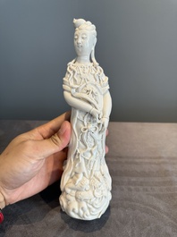 A pair of Chinese white-glazed figures and two Dehua blanc de Chine figures, Dehua 德化 and Xuande mark, 18th C. and later