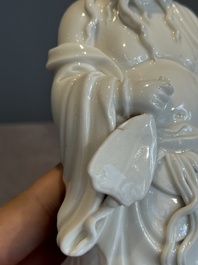 A pair of Chinese white-glazed figures and two Dehua blanc de Chine figures, Dehua 德化 and Xuande mark, 18th C. and later