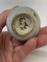 Two Chinese Dehua blanc de Chine Buddha and Wenchang figures, a seal paste covered box, a vase and an iron-red-glazed boy, Qianlong mark, 19/20th C.