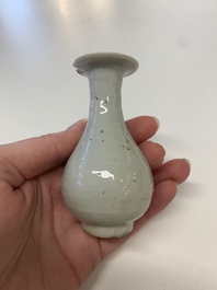 Two Chinese Dehua blanc de Chine Buddha and Wenchang figures, a seal paste covered box, a vase and an iron-red-glazed boy, Qianlong mark, 19/20th C.