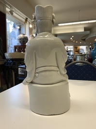 Two Chinese Dehua blanc de Chine Buddha and Wenchang figures, a seal paste covered box, a vase and an iron-red-glazed boy, Qianlong mark, 19/20th C.