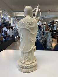 A Chinese Dehua blanc de Chine monk and a Guanyin, He Chaozong 何朝宗 and Dehua 德化 marks, 20th C.