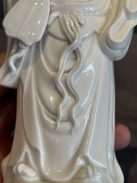 A pair of Chinese white-glazed figures and two Dehua blanc de Chine figures, Dehua 德化 and Xuande mark, 18th C. and later