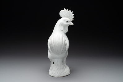 A Chinese white-glazed model of a rooster, 18/19th C.