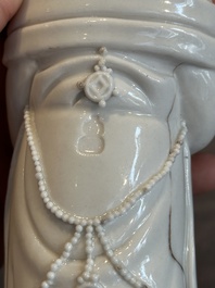 A pair of Chinese white-glazed figures and two Dehua blanc de Chine figures, Dehua 德化 and Xuande mark, 18th C. and later