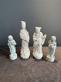 A pair of Chinese white-glazed figures and two Dehua blanc de Chine figures, Dehua 德化 and Xuande mark, 18th C. and later