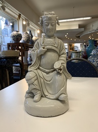 Two Chinese Dehua blanc de Chine Buddha and Wenchang figures, a seal paste covered box, a vase and an iron-red-glazed boy, Qianlong mark, 19/20th C.