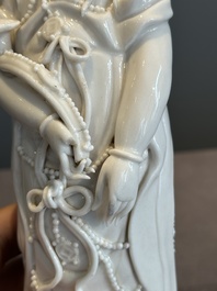 A pair of Chinese white-glazed figures and two Dehua blanc de Chine figures, Dehua 德化 and Xuande mark, 18th C. and later