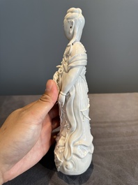 A pair of Chinese white-glazed figures and two Dehua blanc de Chine figures, Dehua 德化 and Xuande mark, 18th C. and later