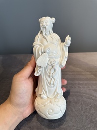 A pair of Chinese white-glazed figures and two Dehua blanc de Chine figures, Dehua 德化 and Xuande mark, 18th C. and later