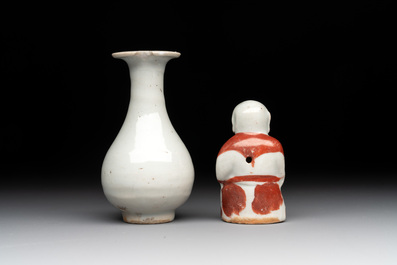 Two Chinese Dehua blanc de Chine Buddha and Wenchang figures, a seal paste covered box, a vase and an iron-red-glazed boy, Qianlong mark, 19/20th C.