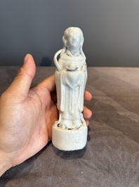 A pair of Chinese white-glazed figures and two Dehua blanc de Chine figures, Dehua 德化 and Xuande mark, 18th C. and later