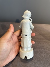 A pair of Chinese white-glazed figures and two Dehua blanc de Chine figures, Dehua 德化 and Xuande mark, 18th C. and later