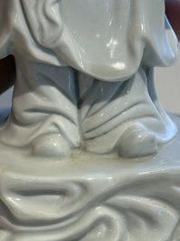 Two Chinese Dehua blanc de Chine figures of Guanyin and Shoulao and a pair of Buddhist lions, He Chaozong 何朝宗 mark, 18/19th C.