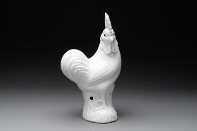 A Chinese white-glazed model of a rooster, 18/19th C.