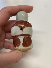 Two Chinese Dehua blanc de Chine Buddha and Wenchang figures, a seal paste covered box, a vase and an iron-red-glazed boy, Qianlong mark, 19/20th C.